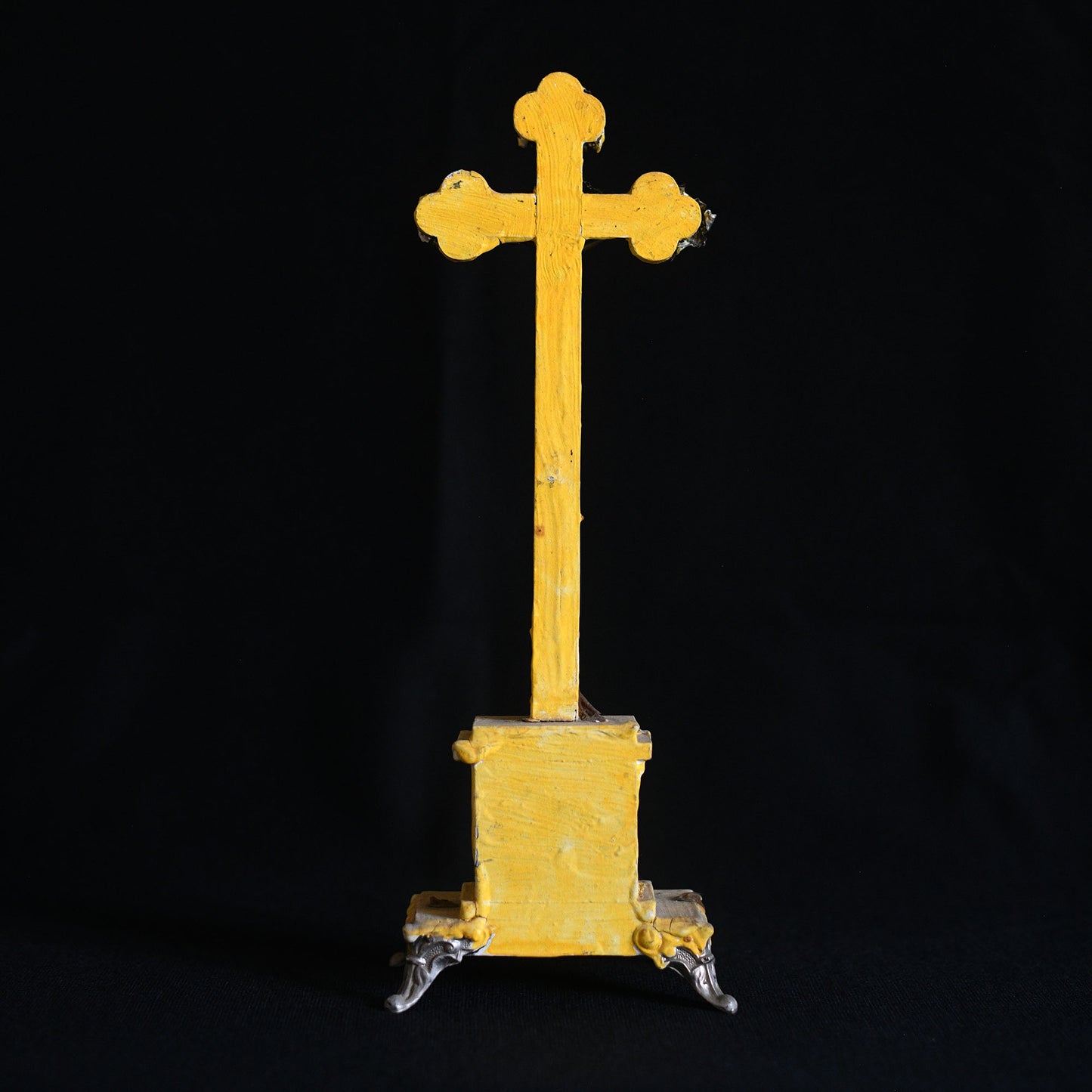 yellow crucifix